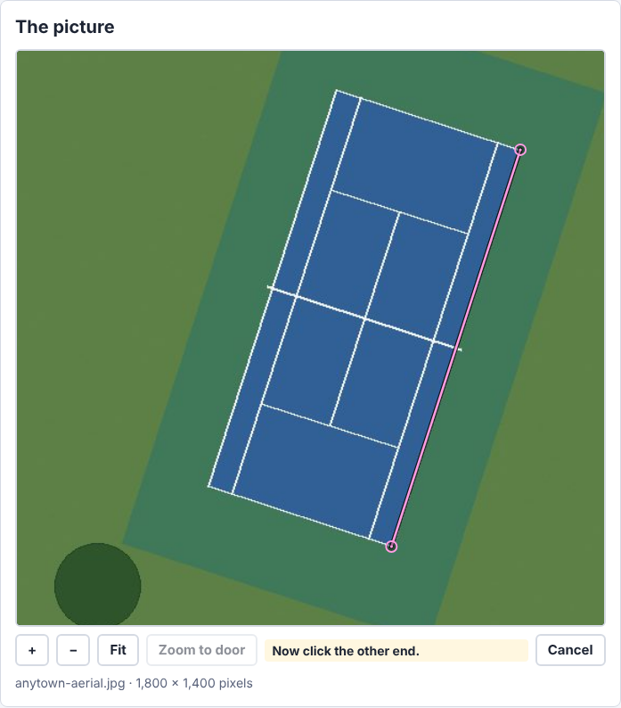Zoomed in on the sample's tennis court: one end of its long side clicked, a pink line to the other end, and the message Now click the other end